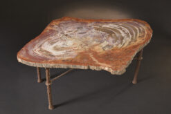 Rare Utah petrified wood table with warm colors and handcrafted design